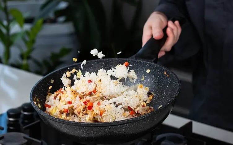 cooking fried rice pan chef